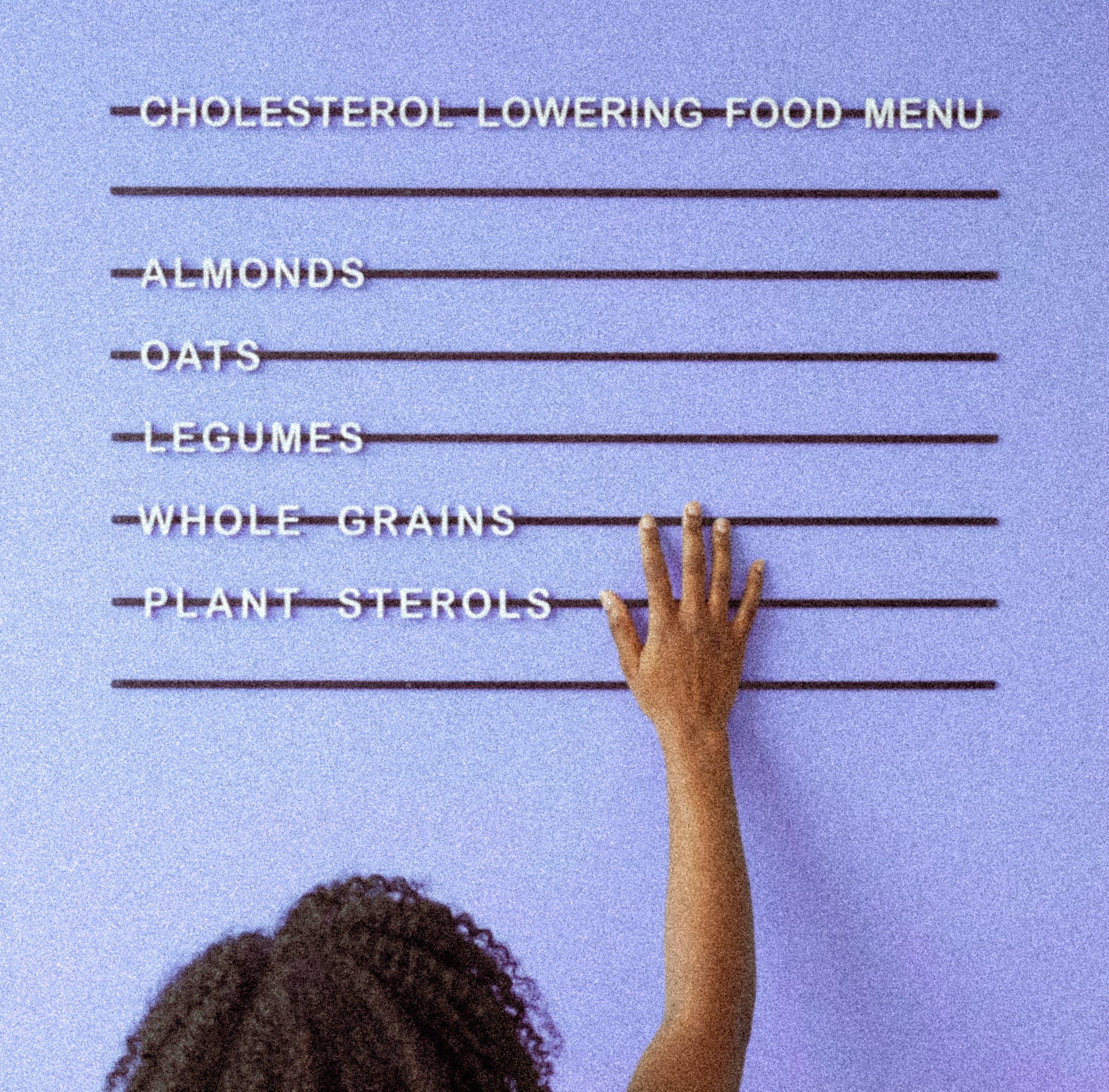 Cholesterol lowering food menu board with hands