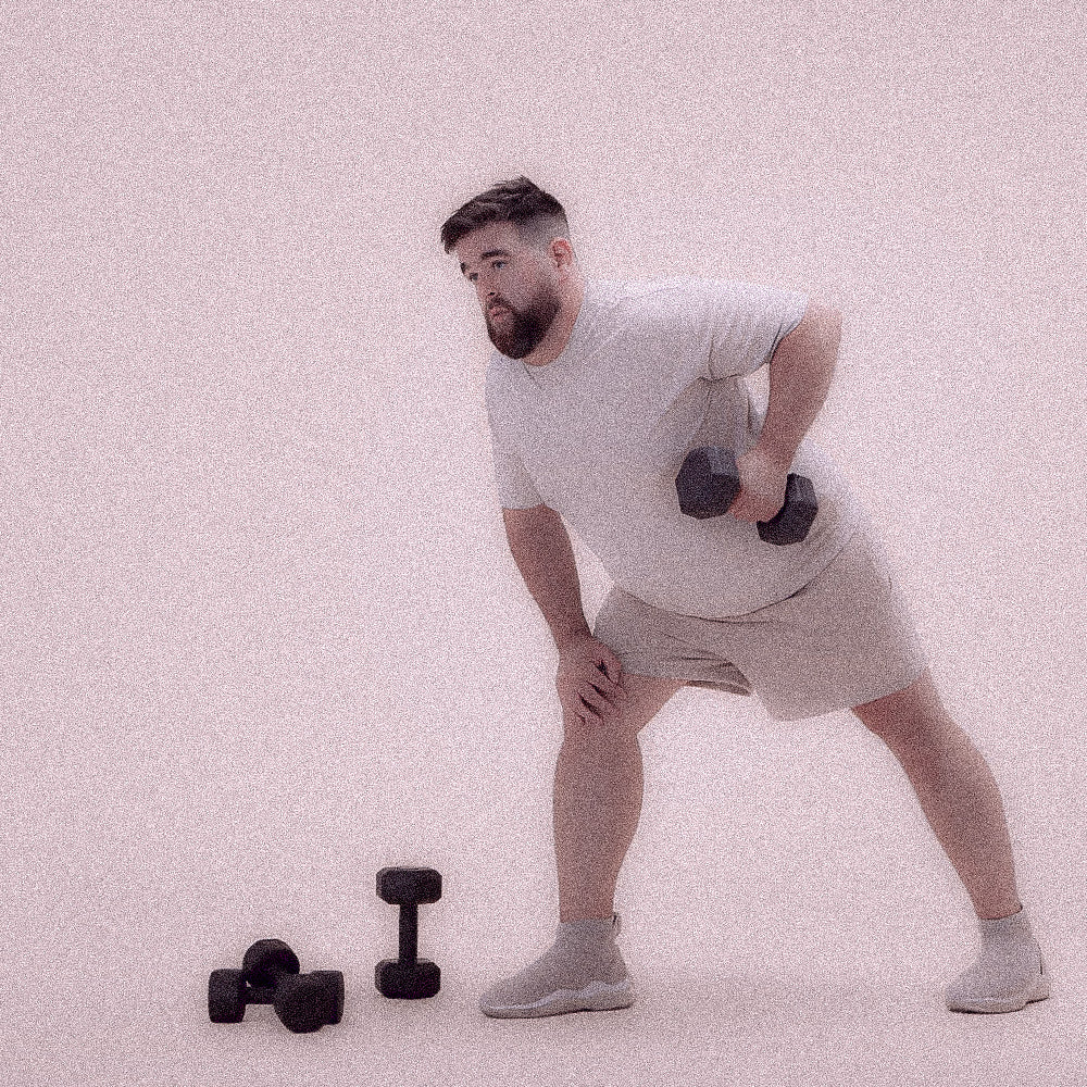 Man exercising with dumbbells 